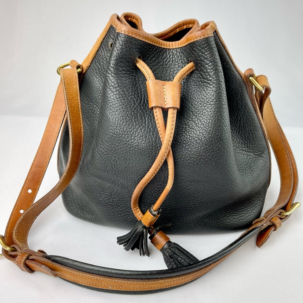 Vintage Dooney & Bourke Black/Tan All-Weather Leather Drawstring Bucket Bag